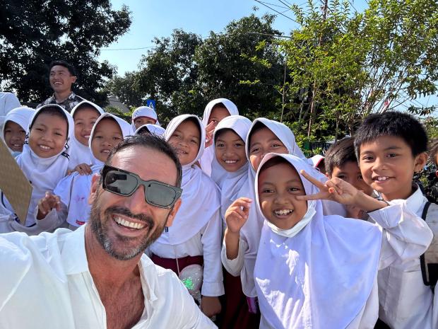 PADI AmbassaDiver Jason Chambers with a group of people.